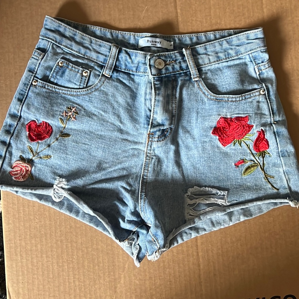 Embroidered rose denim shorts